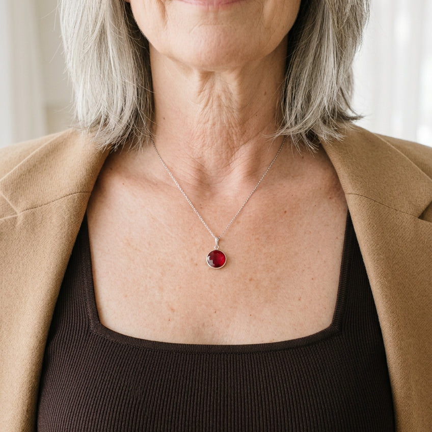 Silver necklace with round faceted ruby red hydro quartz pendant, July birthstone alternative
