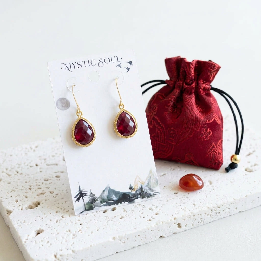 Ruby red hydro quartz teardrop earrings with detailed edge, gift tag and satin pouch
