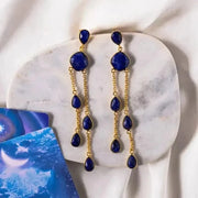 Sapphire blue droplet statement earrings in gold, September birthstone jewelry