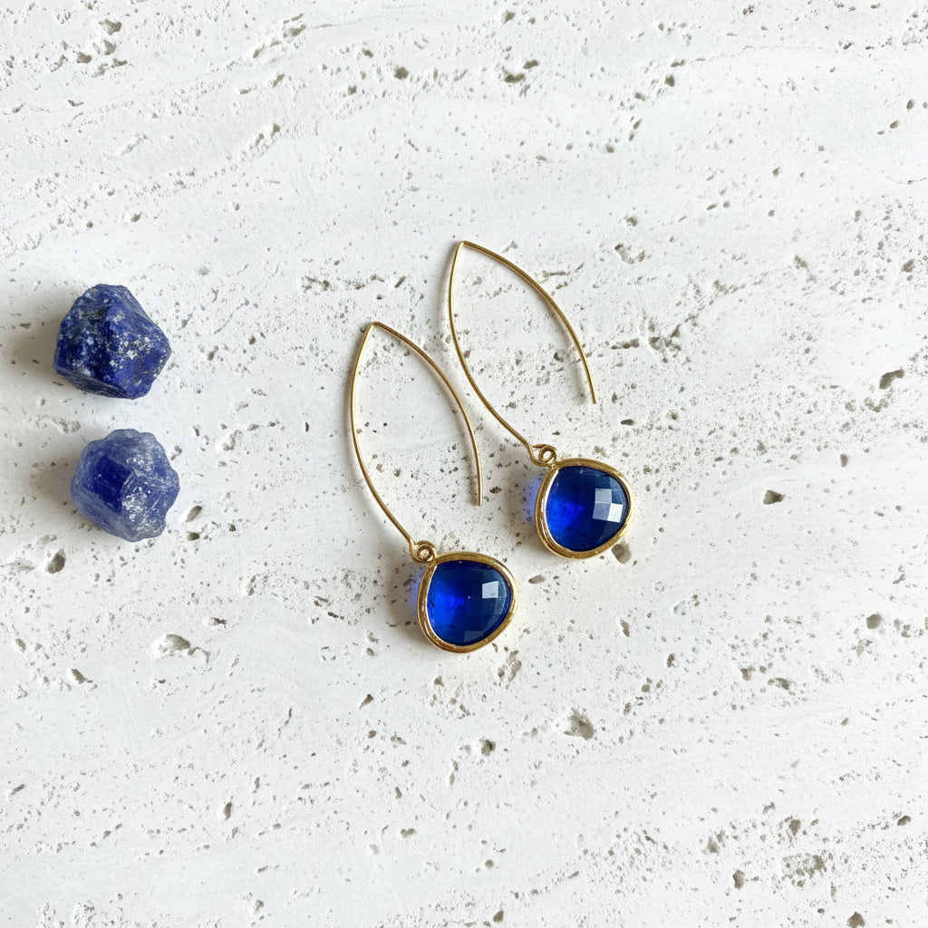 Gold Sapphire Elegant Pebble earrings with faceted deep blue glass, September birthstone colour