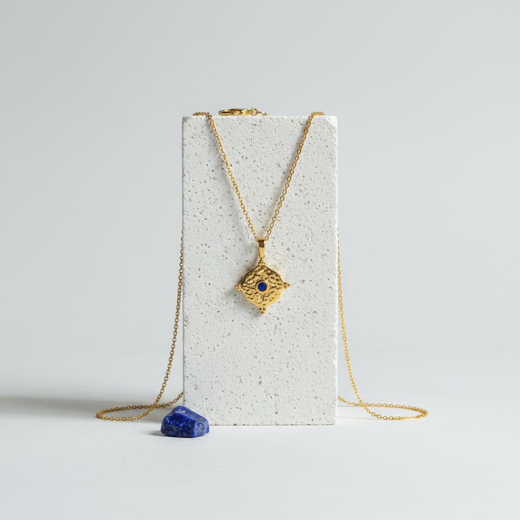 Gold hammered medallion necklace with deep blue sapphire CZ centre, September birthstone jewelry