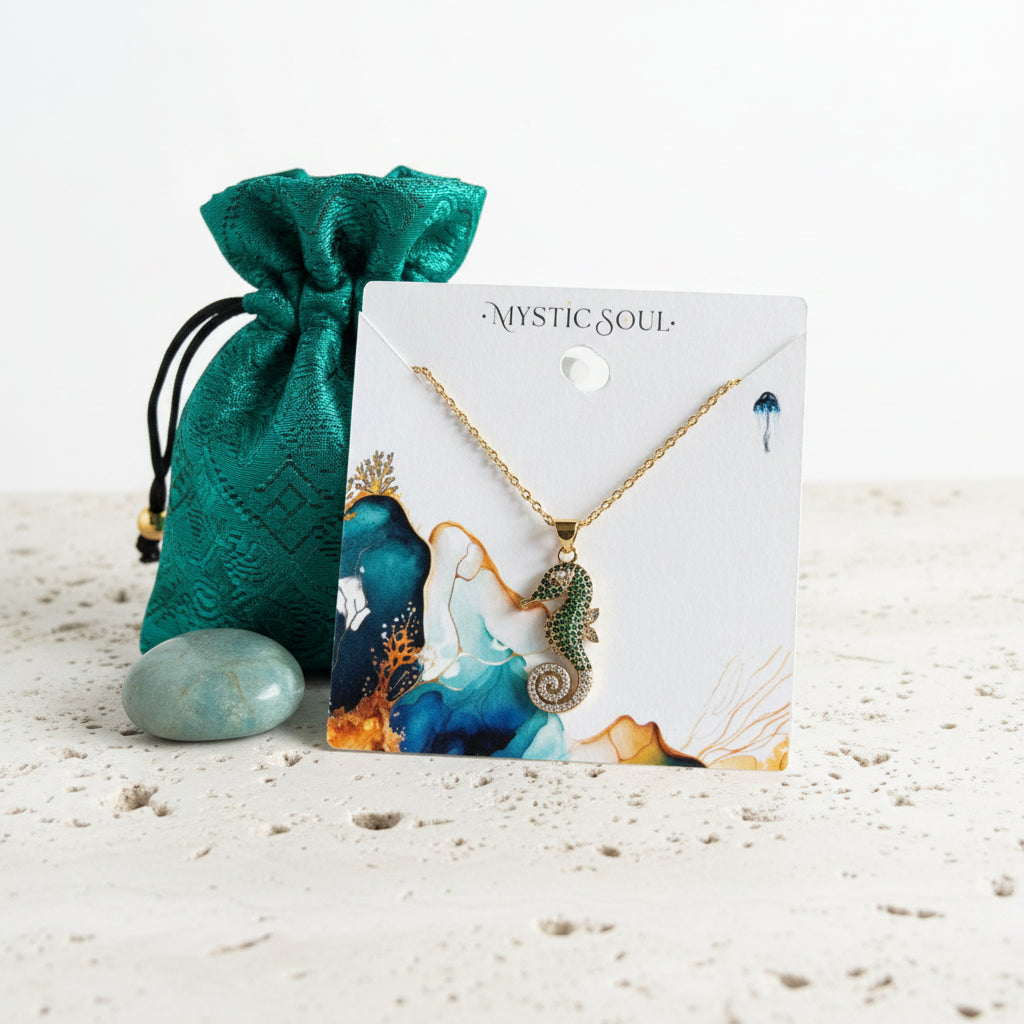 Green crystal seahorse pendant necklace on a Mystic Soul Jewelry card with gift bag