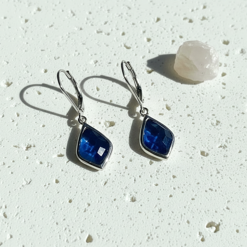 Silver Selene drop earrings with capri blue faceted glass