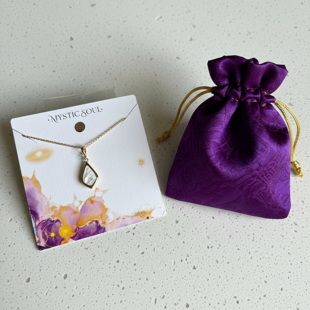 Gold Selene necklace with opalite faceted glass pendant and Mystic Soul gift bag