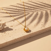 Gold pearl in clam shell pendant necklace — 7.5mm shell, water element jewelry