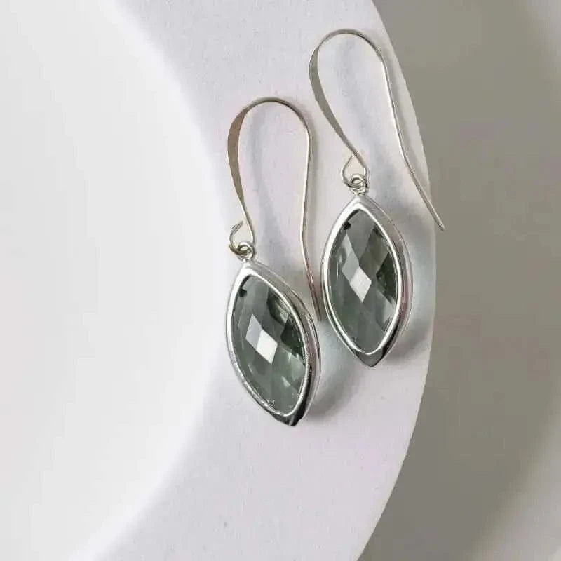 Marquis Silver Dusk Earrings featuring beaded dusk hue and elegant silver design, perfect for adding chic style.