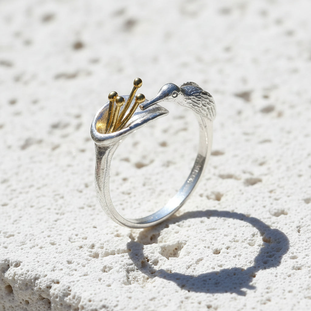 Silver and gold hummingbird ring — spirit animal jewelry for joy and lightness