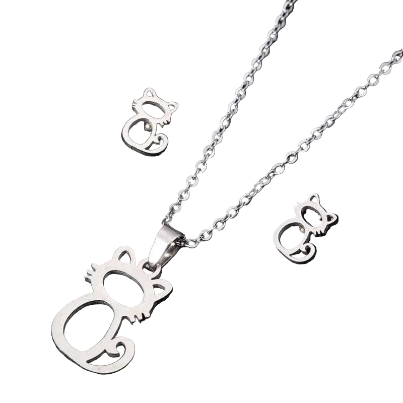 Cat-themed jewelry set with necklace, earrings, and pendant on a black background