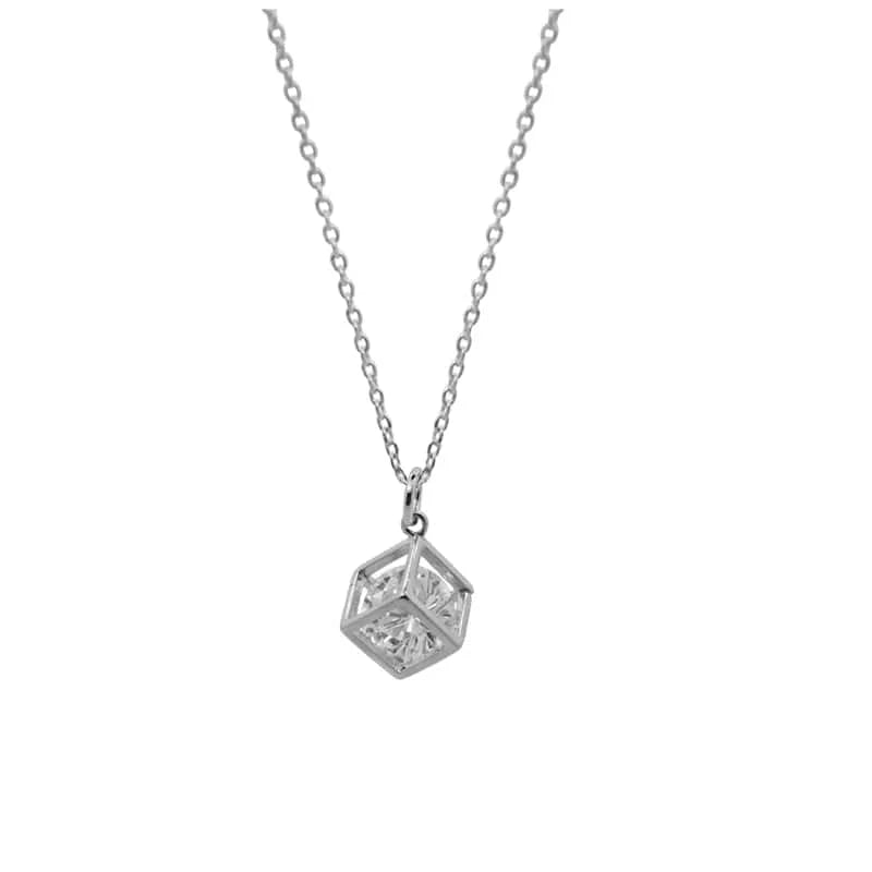 Silver geometric pendant necklace on a white background