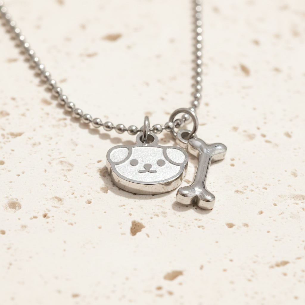 Silver dog bone medallion pendant necklace in stainless steel — Crystals & Paws rescue jewellery for loyalty