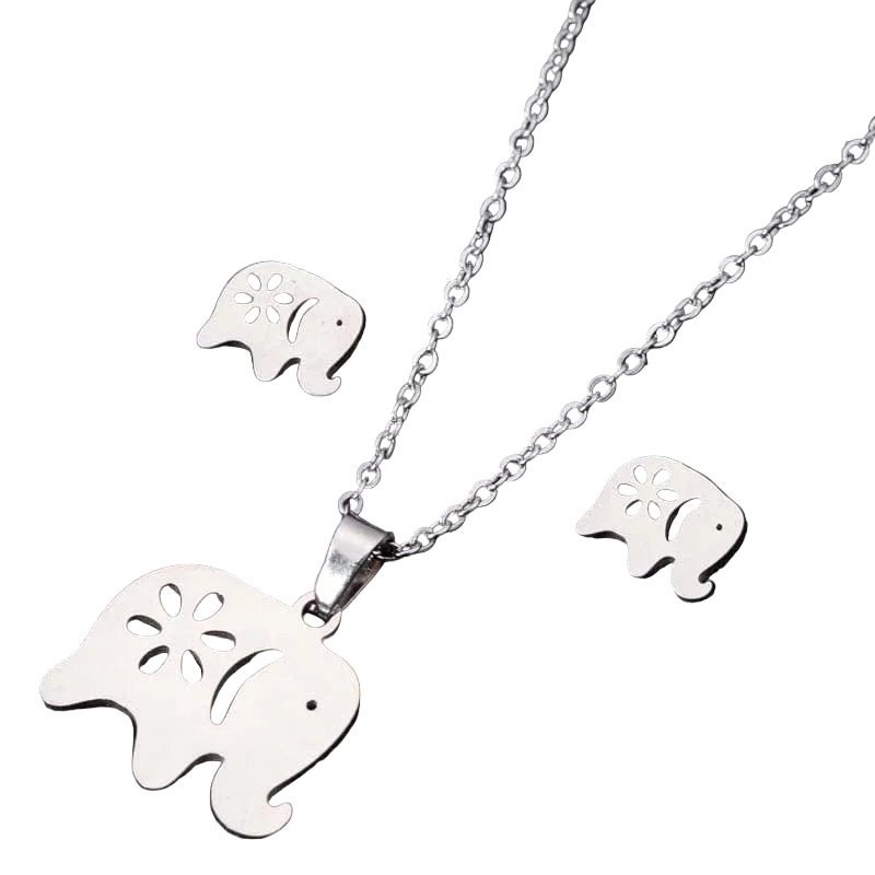 Silver elephant pendant necklace and earrings on a black background