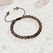 Beaded bracelet on a textured white surface