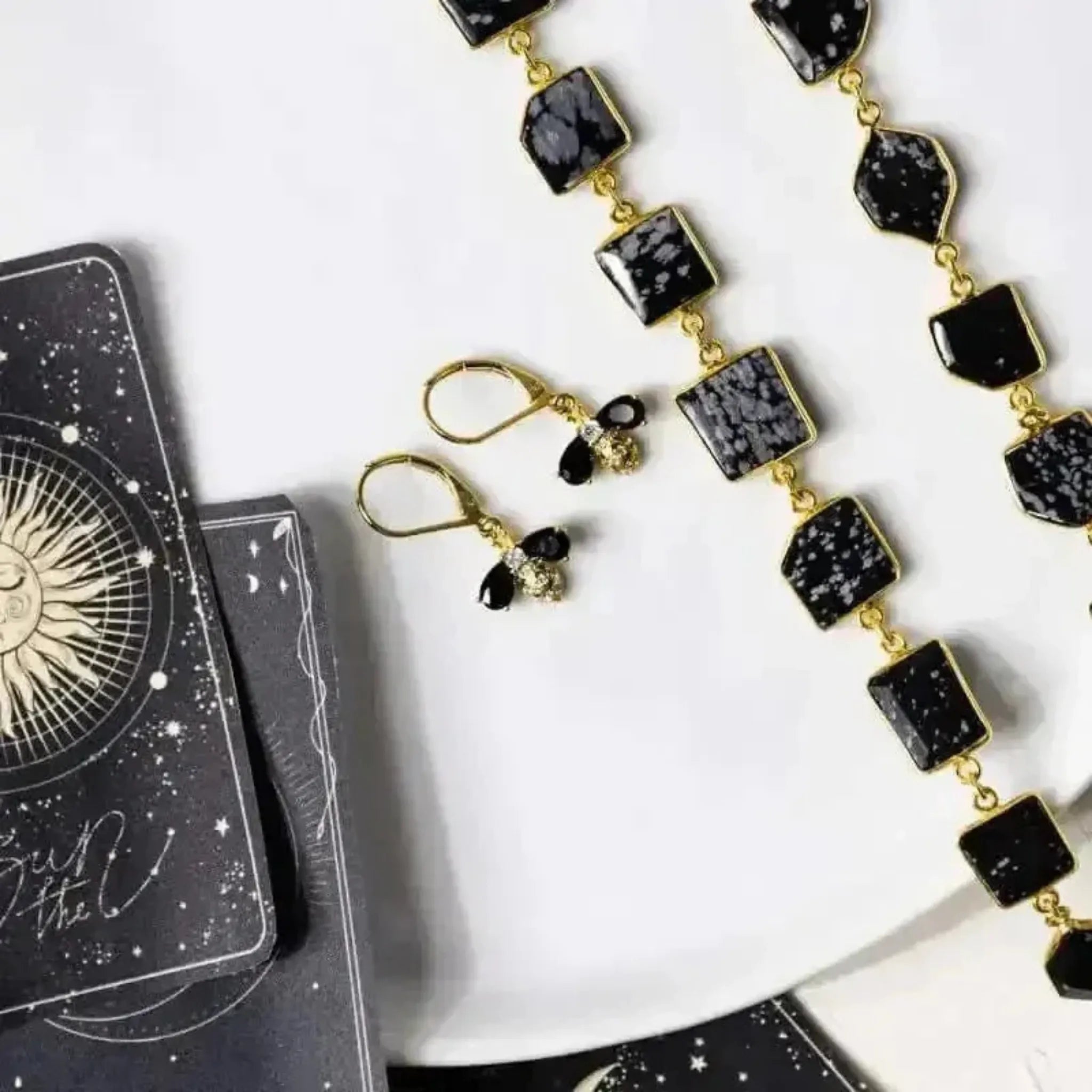snowflake obsidian chain necklace and bee earrings