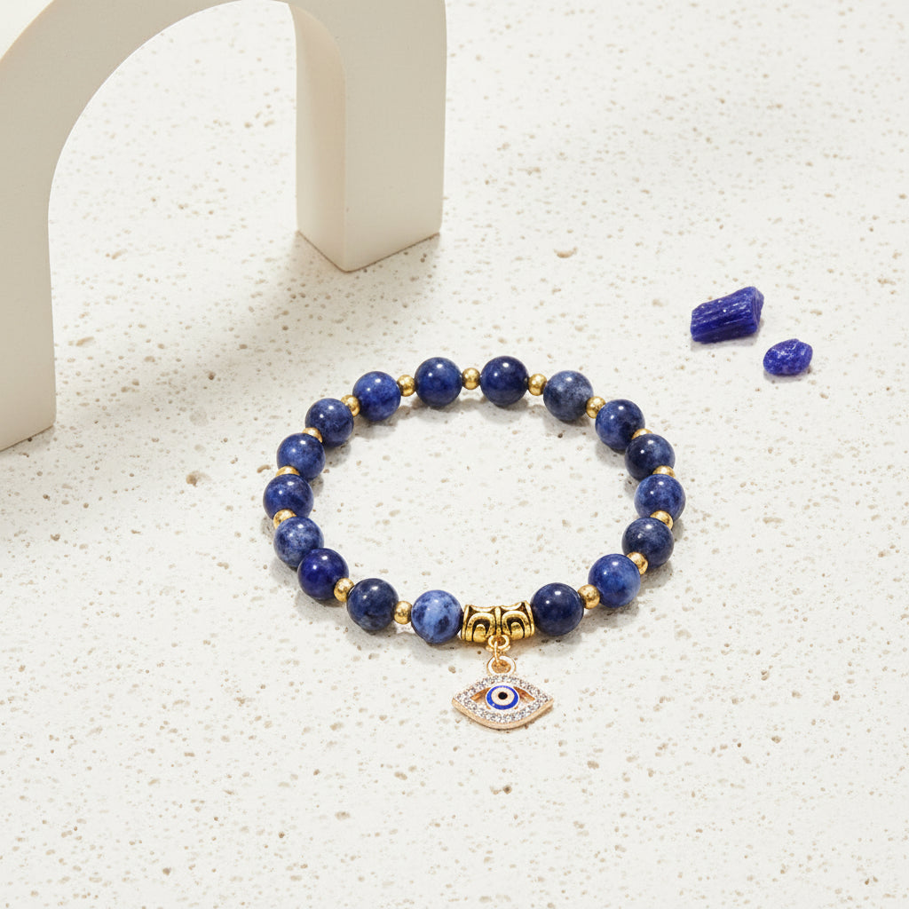 Sodalite evil eye stretch bracelet on natural stone beads — symbol jewellery for protection