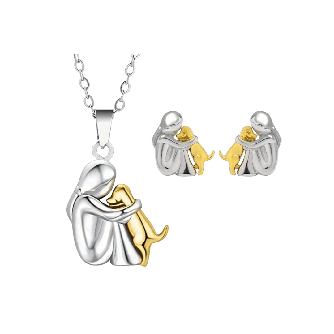 Jewelry set with silver and gold design on a white background