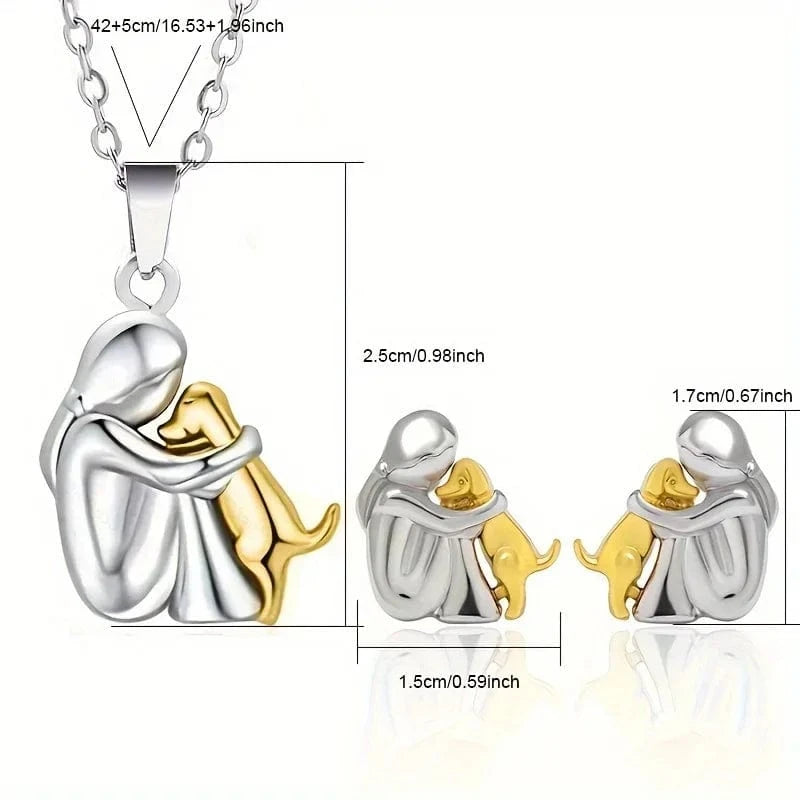 Jewelry set with a mother and child pendant and matching earrings, showing dimensions on a white background.