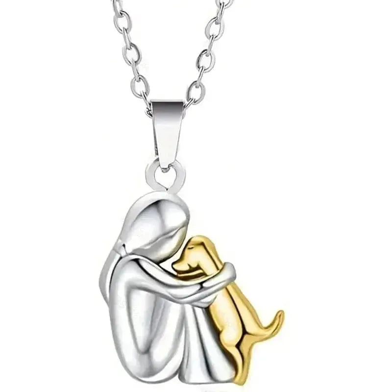 Necklace with a silver and gold pendant on a white background