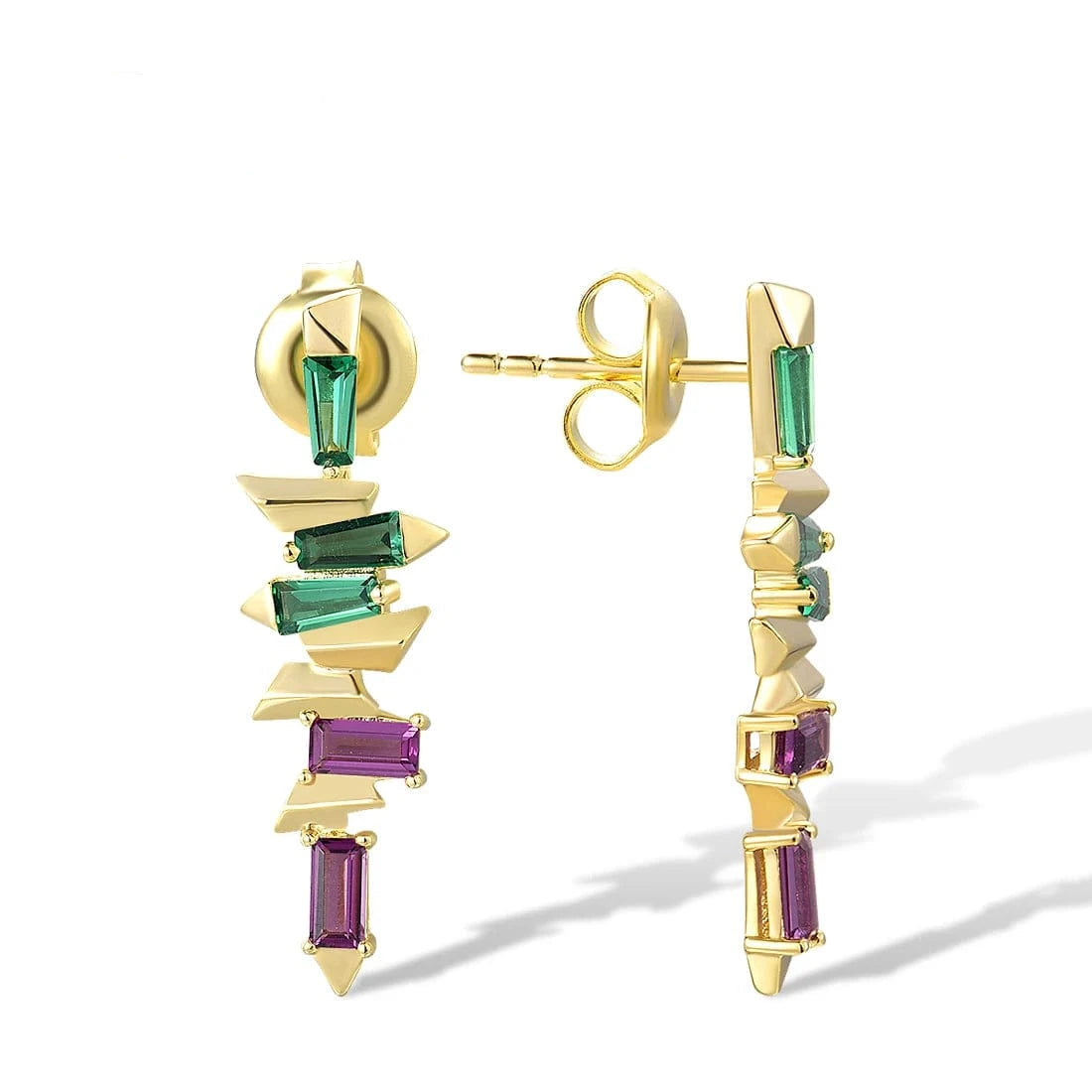 Gold earrings with green and purple gemstones on a white background