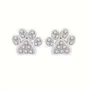 crystal stud earrings with engraved paw designs on a white background