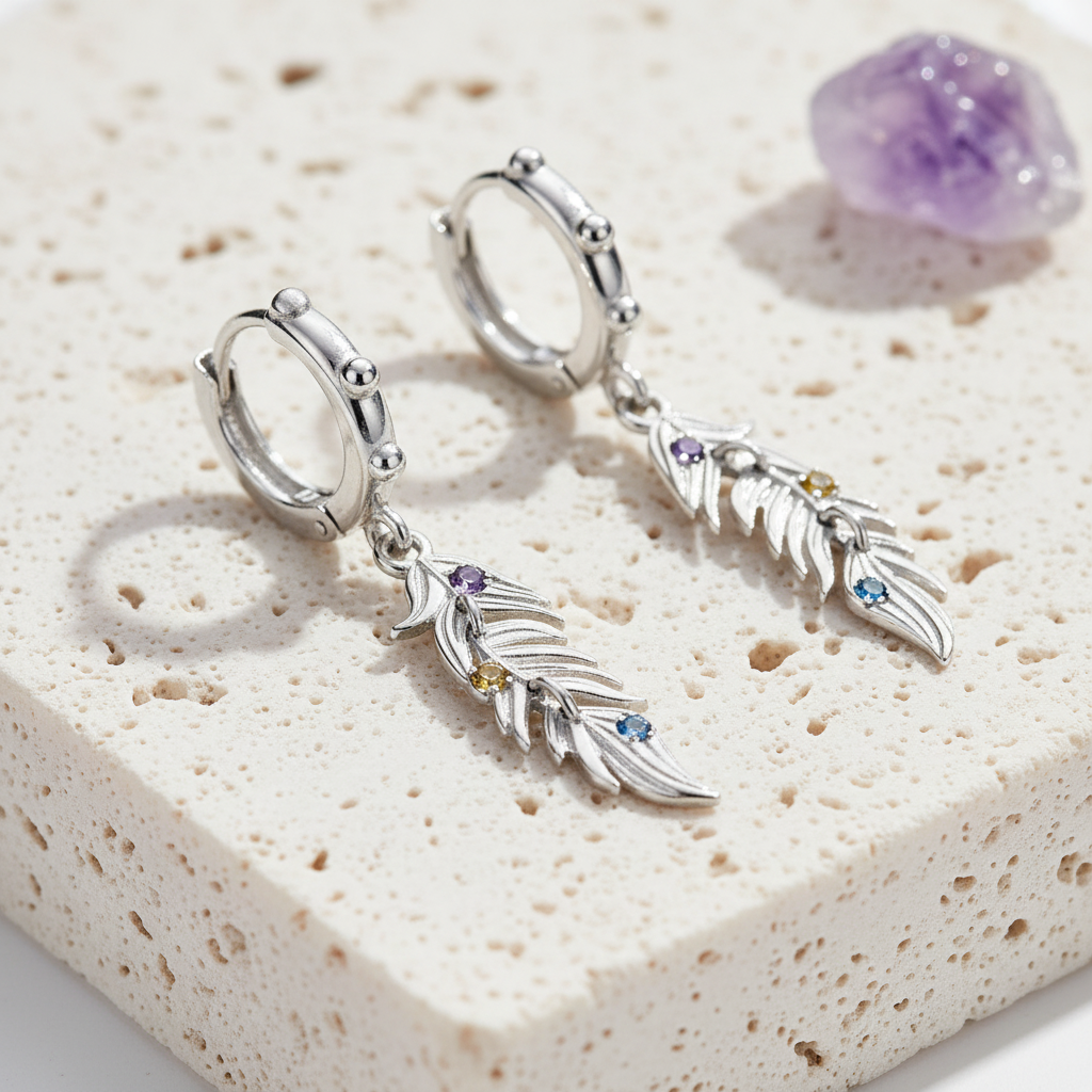 Sterling silver feather earrings set with colourful crystals