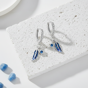 Sterling silver feather hoop earrings set with zircon