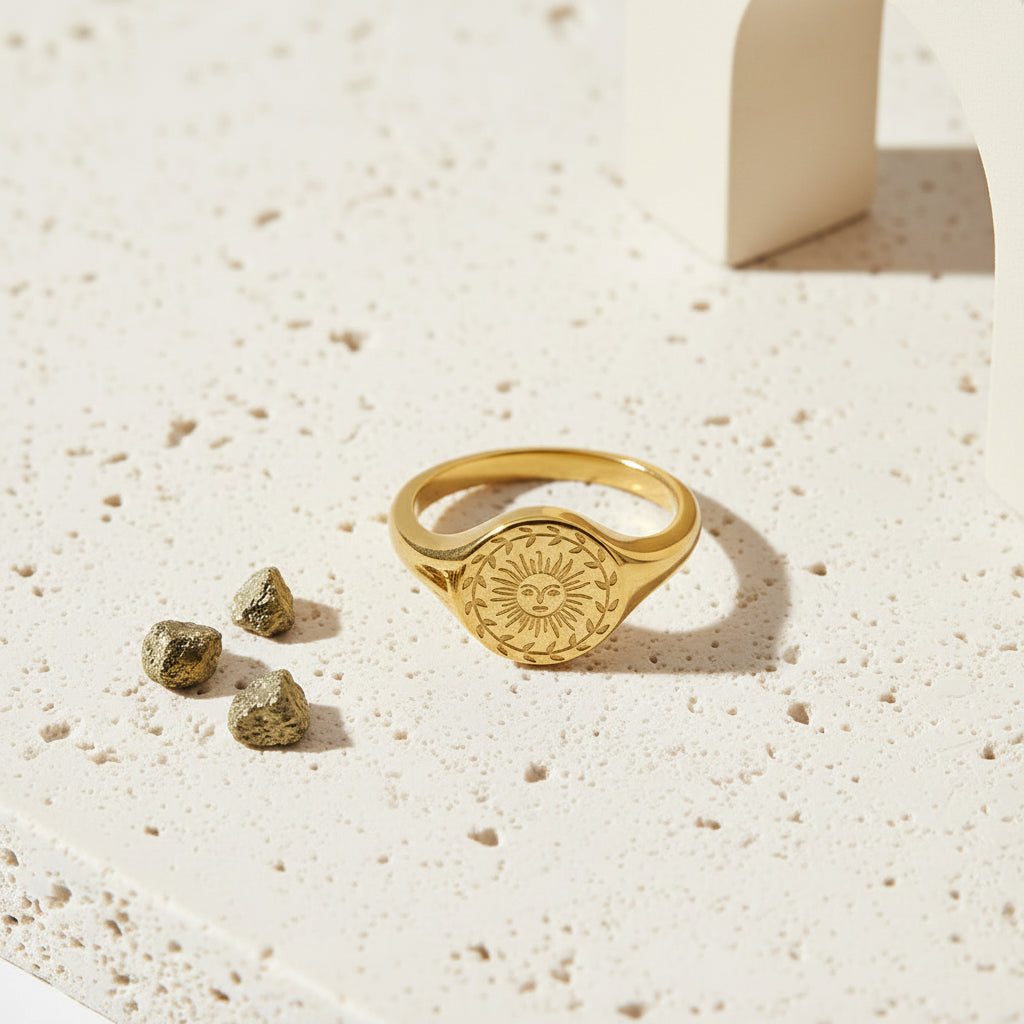 18K PVD gold sun ring, angled view of the waterproof stainless steel band