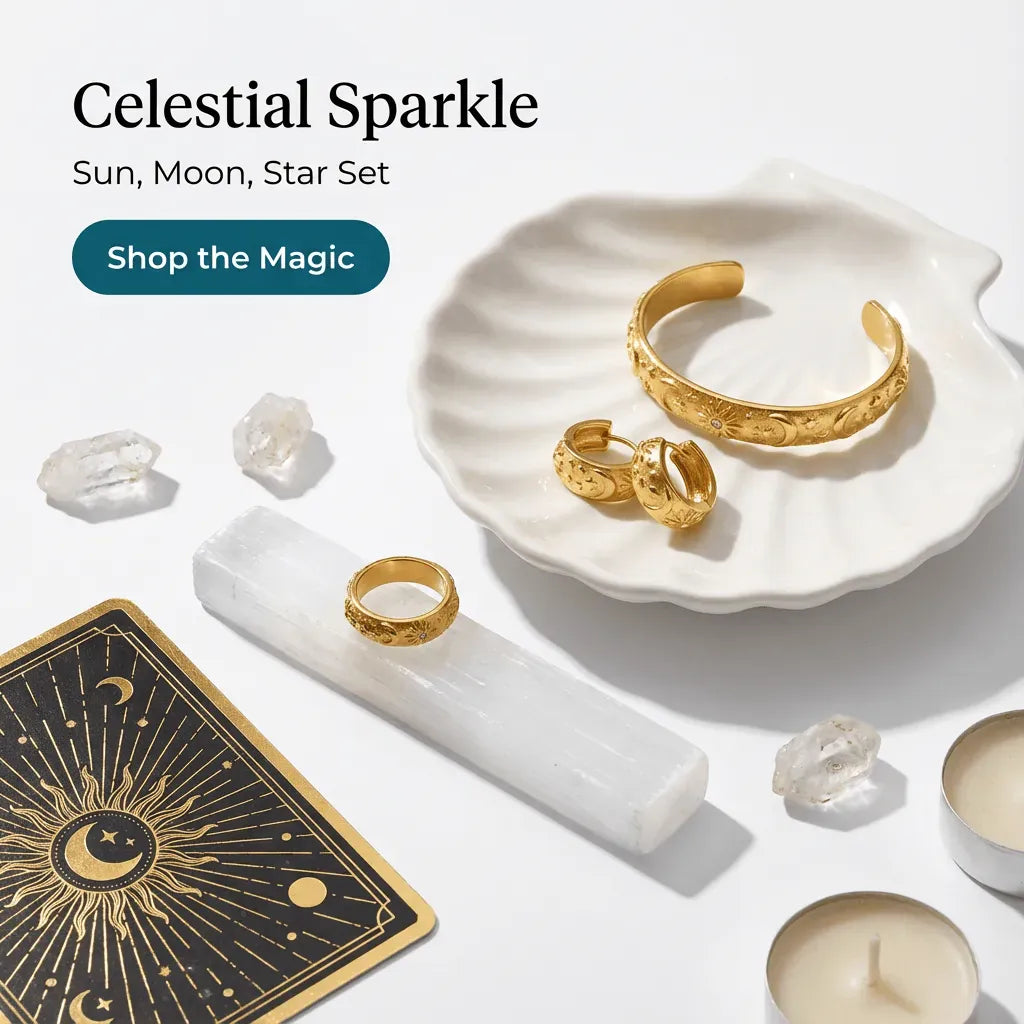 Gold jewelry set with celestial theme on a white surface