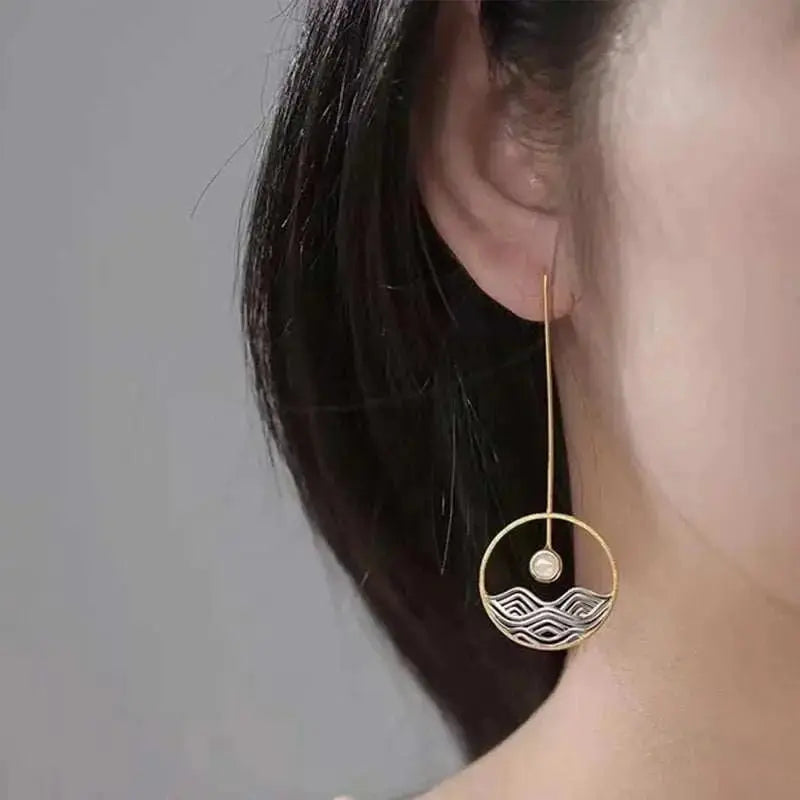 long gold earrings