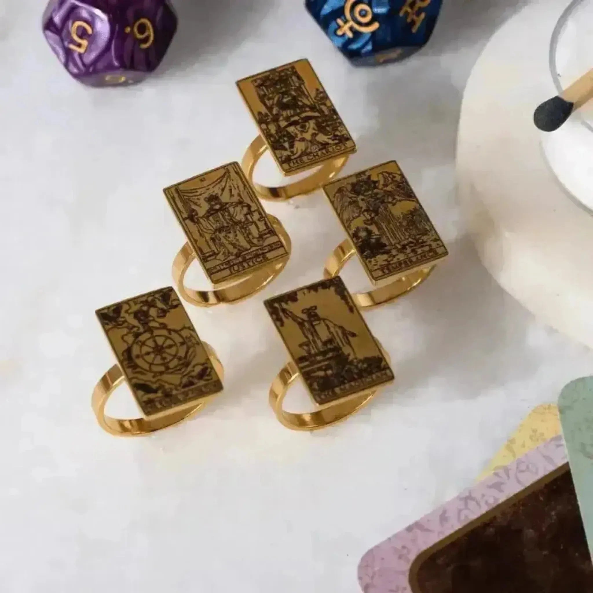 Gold tarot card rings with dice and candle — spiritual symbol jewelry for guidance