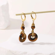 tiger eye gemstone earrings Pair on a white background