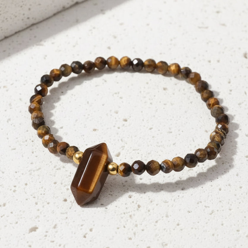 Bracelet with tiger eye stone on a white background