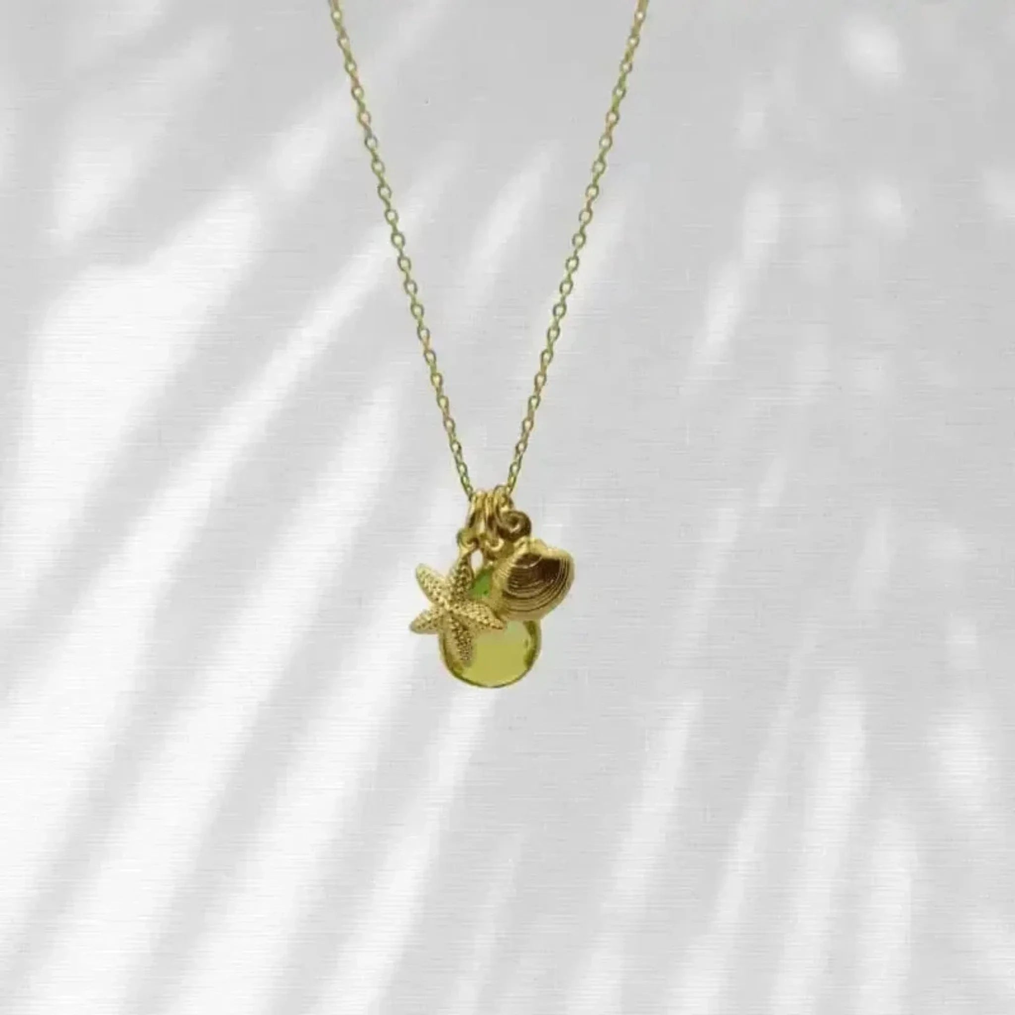 tropical green aura quartz drop necklace with starfish and clam