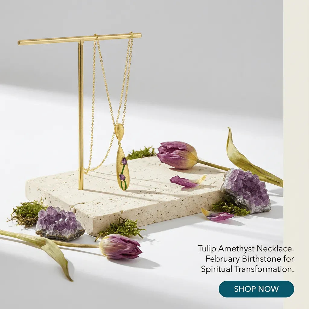 Tulip Amethyst Necklace displayed on a stand with flowers and stones on a light background