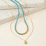 THandmade semi-precious stone beaded choker necklaces in chakra colours 