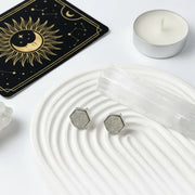 Mystic Soul Jewelry Druzy Hex Stud Earrings with tarot card, crystal, and candle on a white background