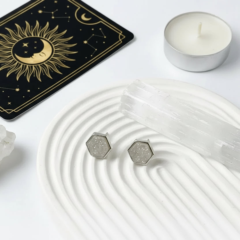 Mystic Soul Jewelry Druzy Hex Stud Earrings with tarot card, crystal, and candle on a white background