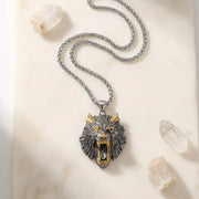 Wolf head pendant necklace on a marble surface