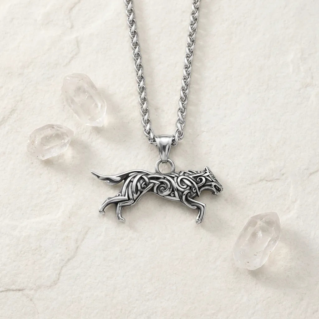 Silver wolf pendant necklace on a white background